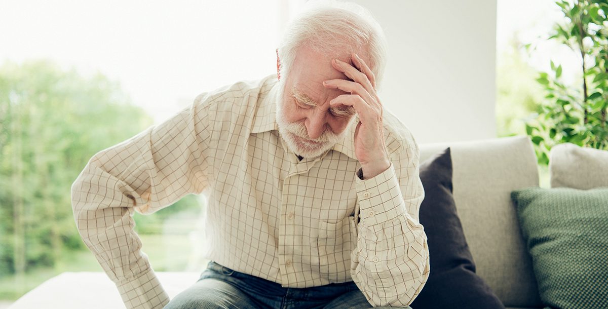 A man experiencing the signs and symptoms of a stroke