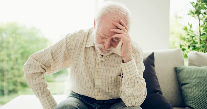 A man experiencing the signs and symptoms of a stroke