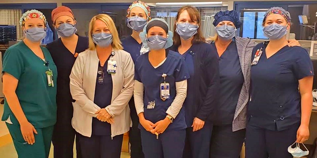 Bon Secours St. Francis nurses wearing masks donated by Heather.