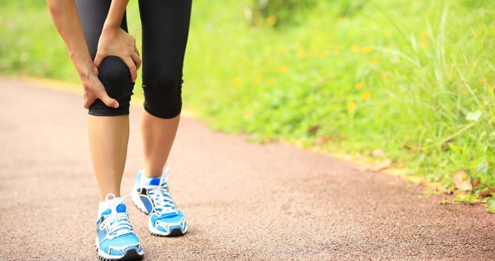 A person experiencing joint pain during the summer months.