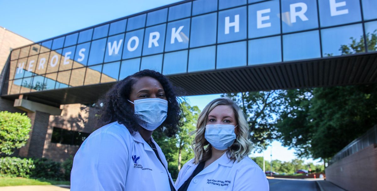 Symone McWilliams and Taylor Kaye Servais outside Bon Secours St. Francis Health System.