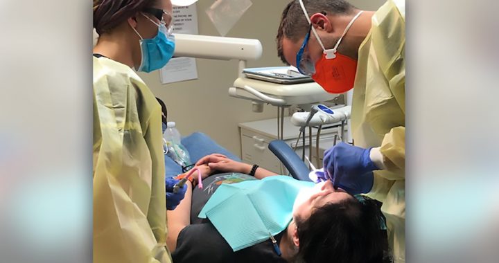 Volunteers performing dental services at the Greenville Free Medical Clinic.