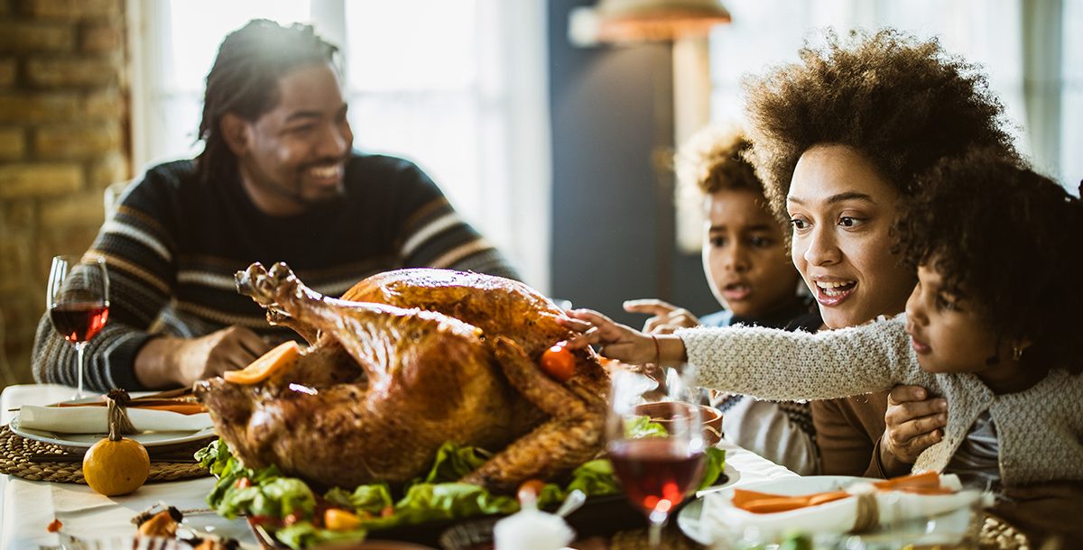 A immediate household celebrating Thanksgiving at home