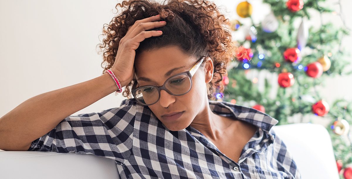 A woman grieving during the holiday season.