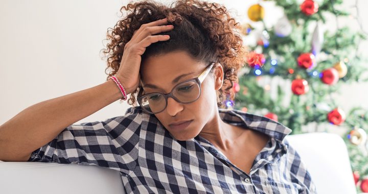 A woman grieving during the holiday season.