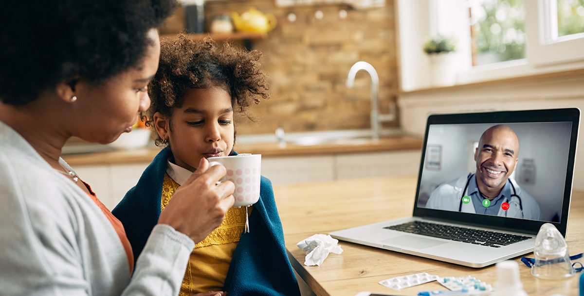 A mom having a video visit from home.