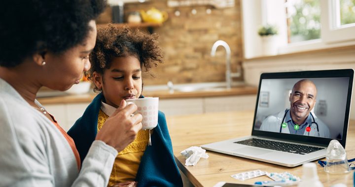 A mom having a video visit from home.