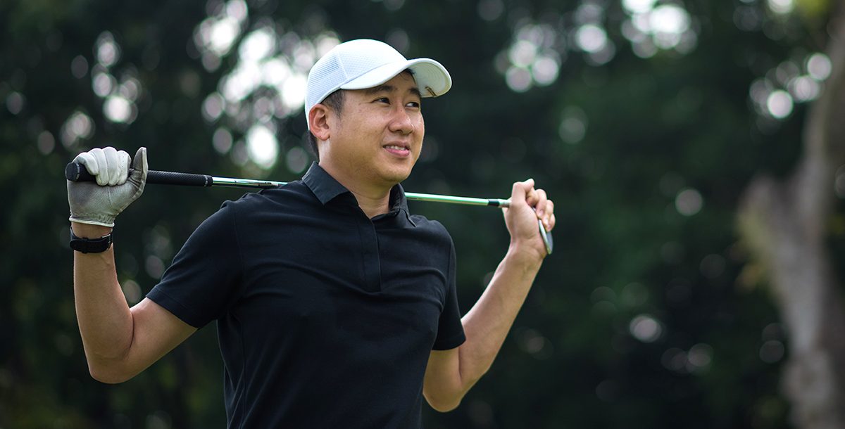 A man playing a round of golf.