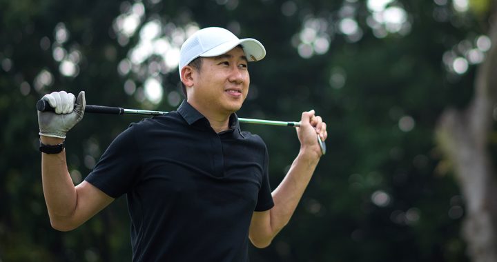 A man playing a round of golf.