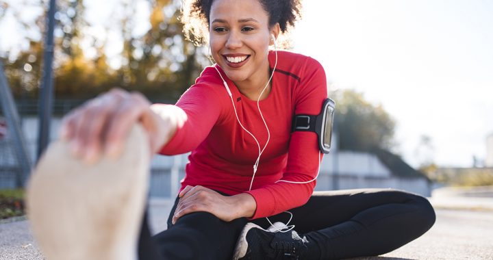 A woman stretching before her run.