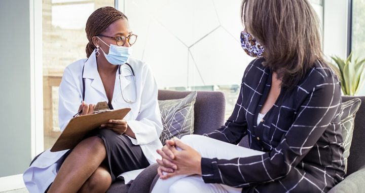 A patient talking to their provider about lung cancer screenings.