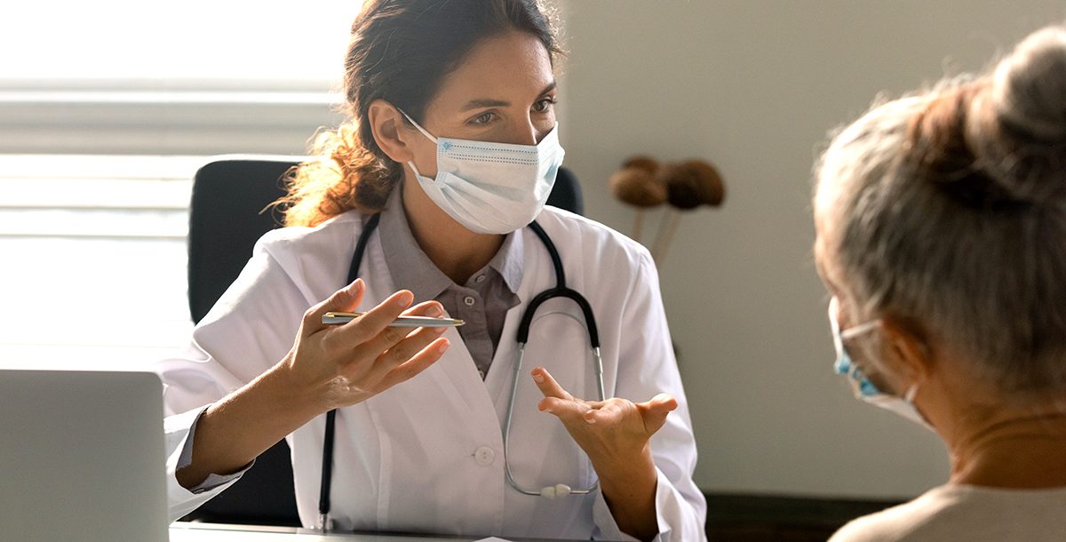 A nurse practitioner with her patient.