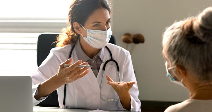 A nurse practitioner with her patient.