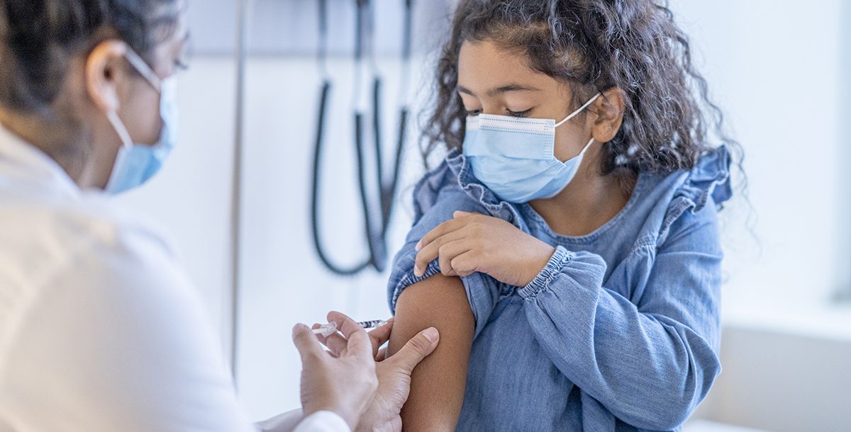 A child getting vaccinated for COVID-19.