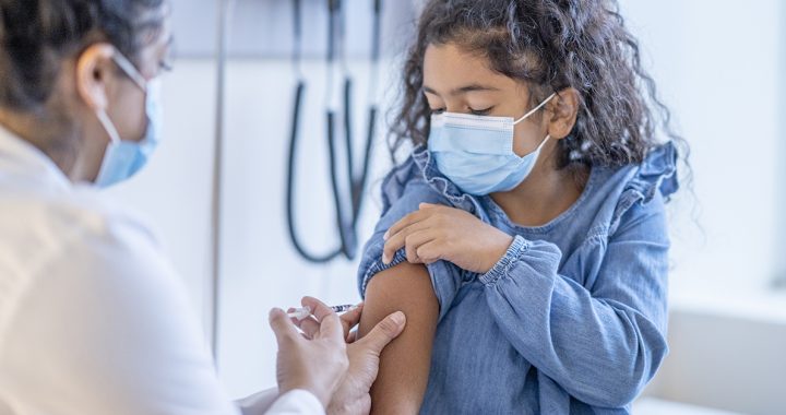 A child getting vaccinated for COVID-19.