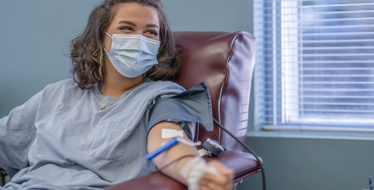 A woman donating blood.