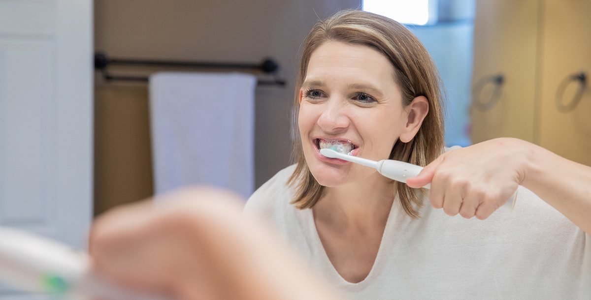 someone brushing their teeth